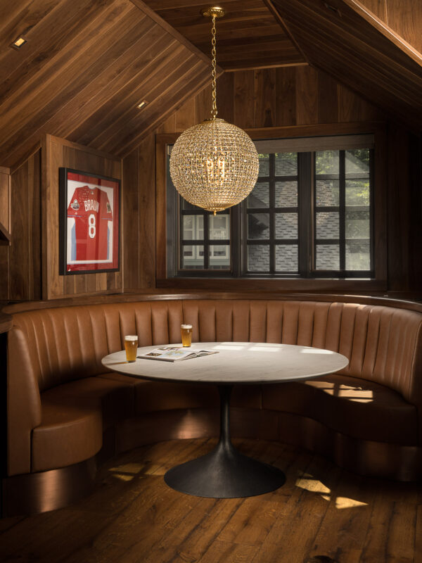 speakeasy_lodge2 The charming lounge area at the speakeasy lodge featuring craft beer, custom furniture and a statement light fixture