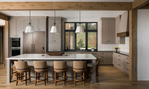 Modern Kitchen Design with custom cabinetry, quartz countertops and statement lighting.