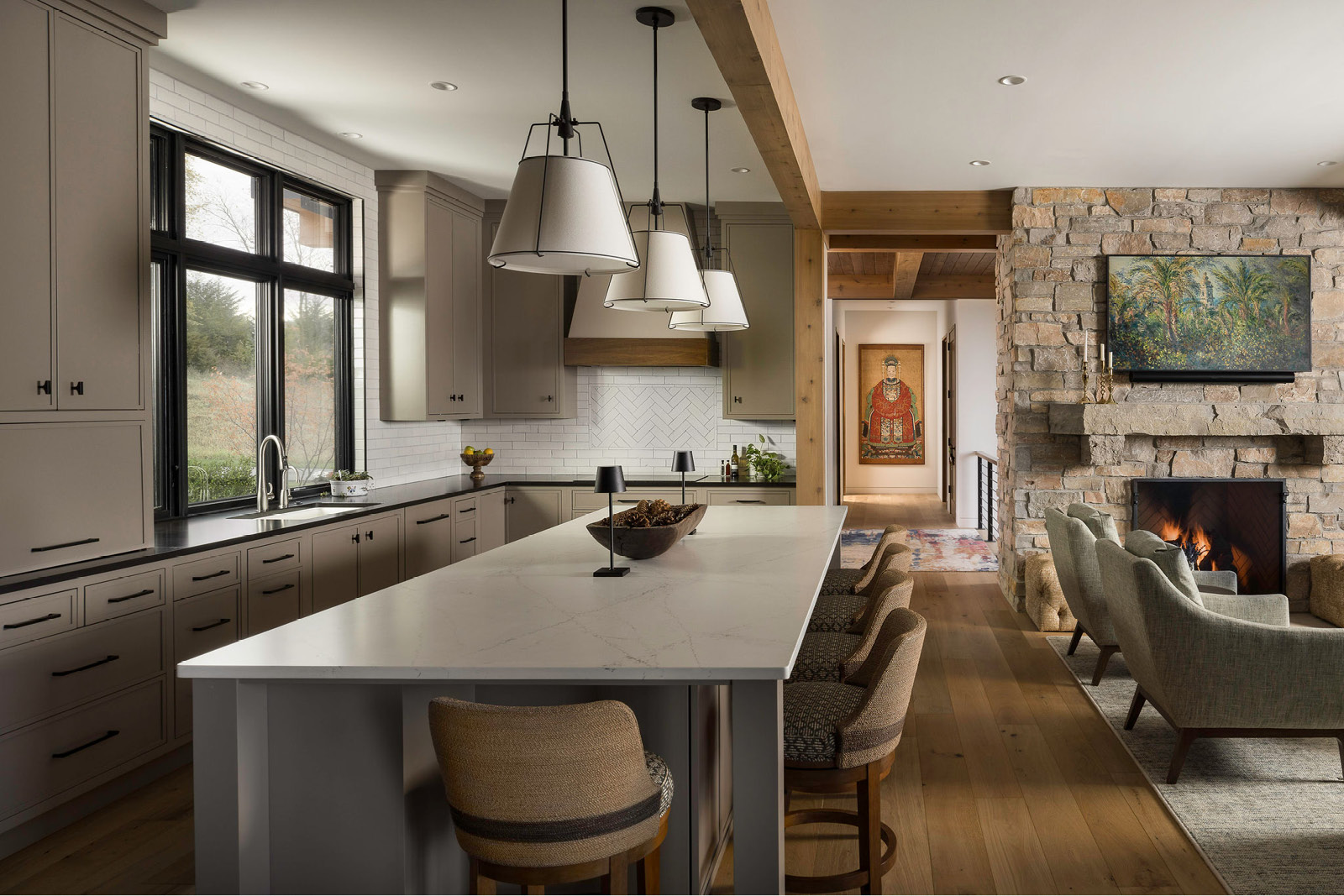 Modern Kitchen Design with custom cabinetry, quartz countertops and statement lighting.