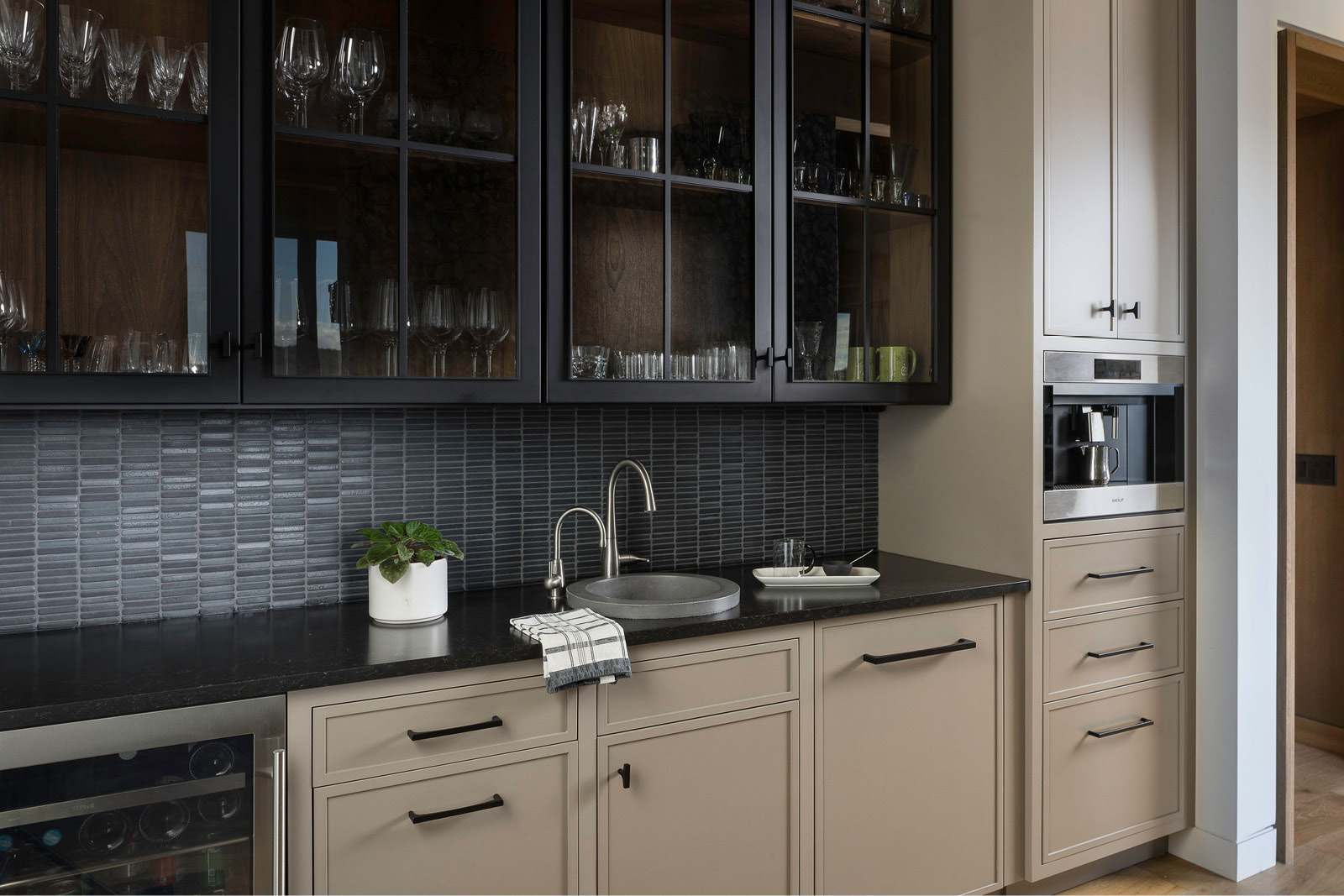 Custom Wet Bar featuring espresso maker, wine fridge and custom cabinetry