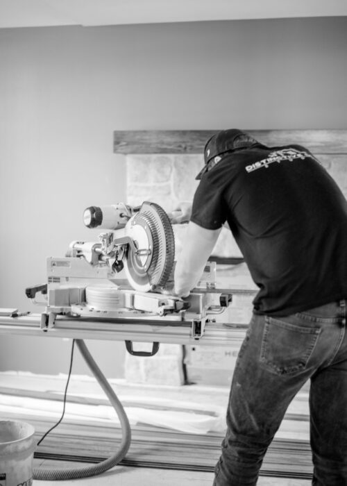 Distinctive Design Studio carpenter at work during a Wisconsin home renovation
