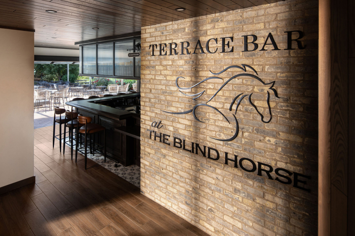 Terrace Bar at The Blind Horse Terrace in Kohler, Wisconsin, with custom signage on Cream City brick